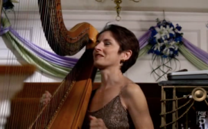 Happiest harpist ever. This is her jam, y'all.
